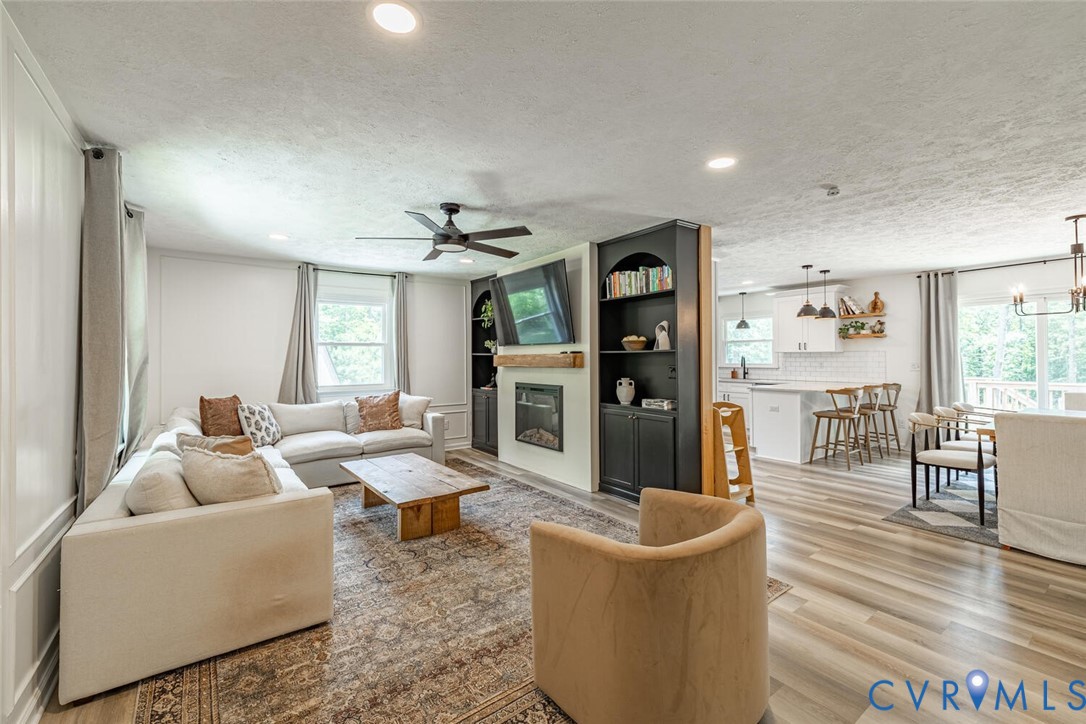 12397 New Market Mill Road Beaverdam, VA 23015 - Photo 2 of 44 a living room with furniture and wooden floor