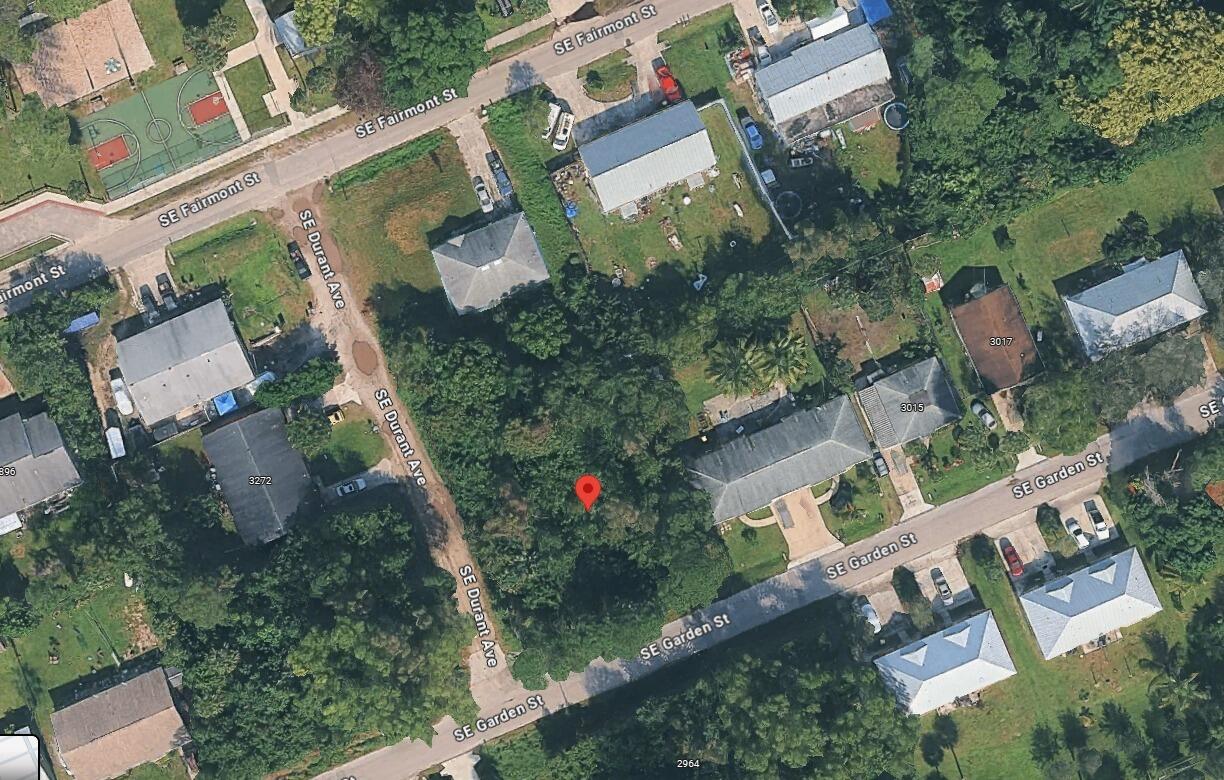 an aerial view of house with yard