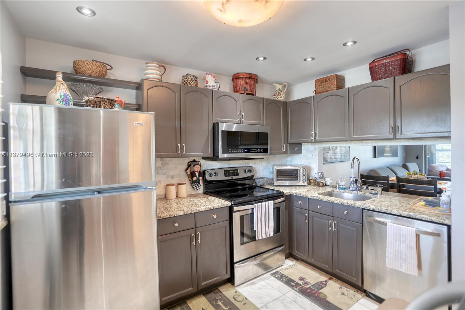8856 West McNab Road, Unit 303 Tamarac, FL 33321 - Photo 1 of 21 Gallery Image 1
