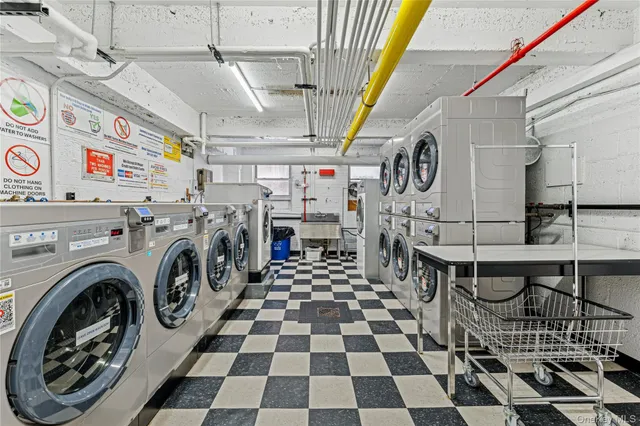 a view of entryway with a washer and dryer