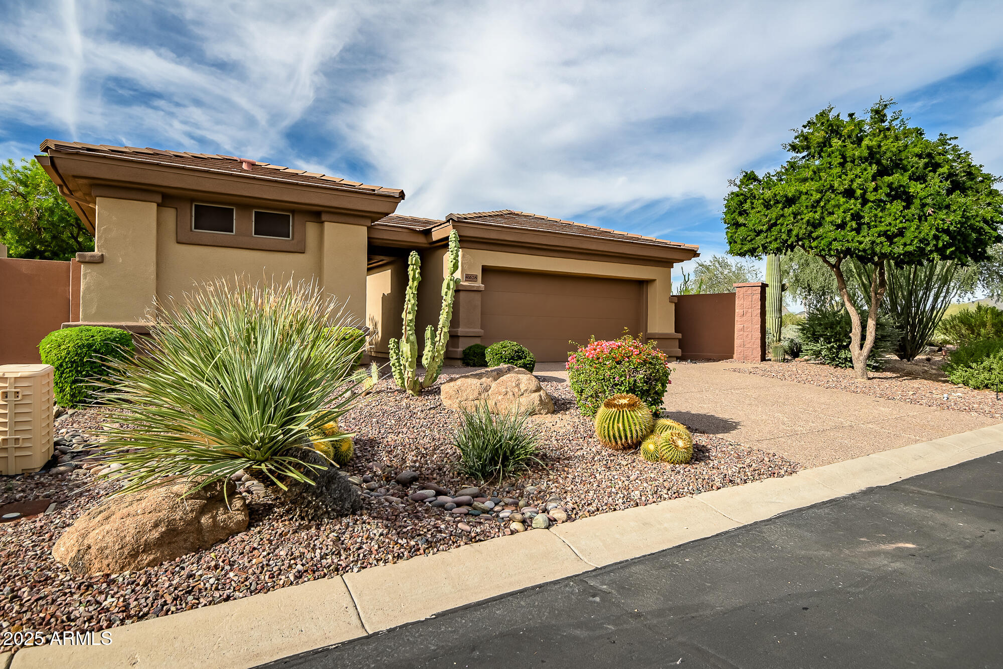 41628 North Cedar Chase Road Anthem, AZ 85086 - Photo 1 of 36 a front view of a house with garden