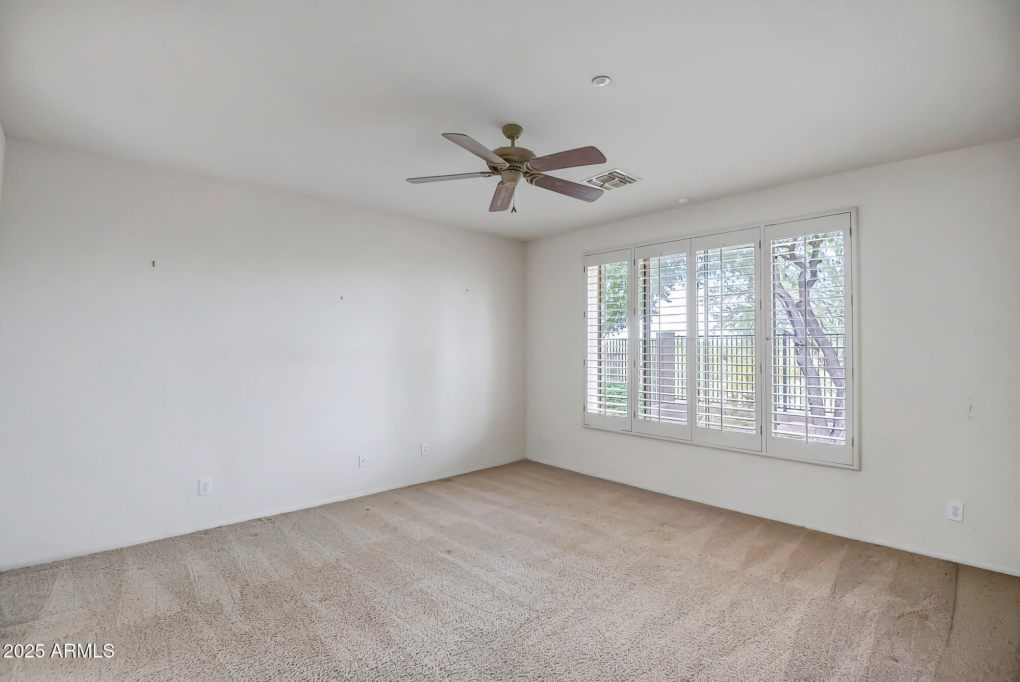 41628 North Cedar Chase Road Anthem, AZ 85086 - Photo 19 of 36 wooden floor in an empty room with a window