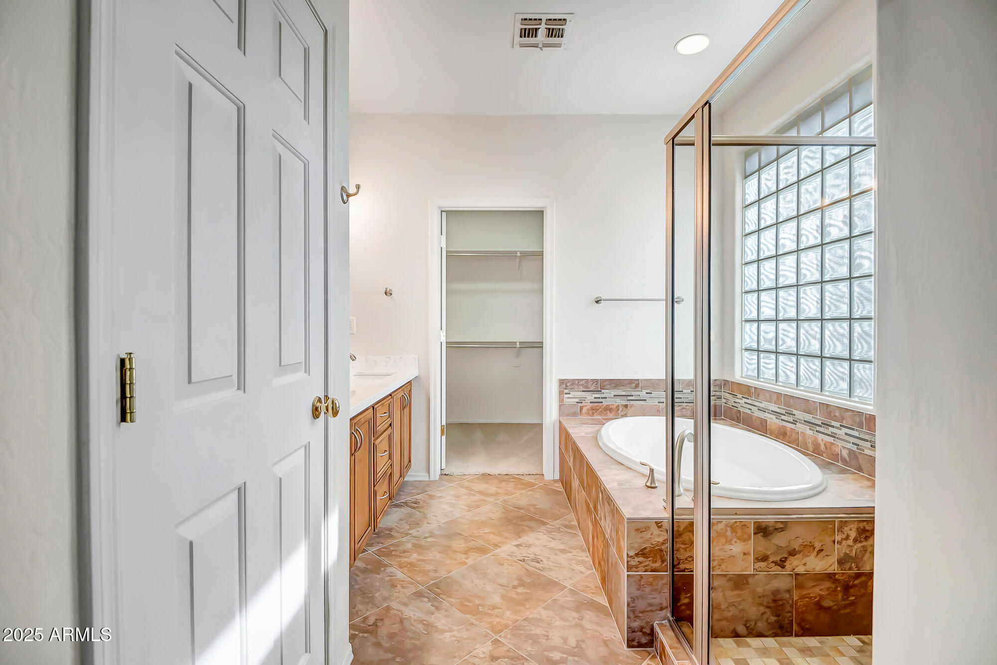 41628 North Cedar Chase Road Anthem, AZ 85086 - Photo 21 of 36 a view of a bathroom with tub and door