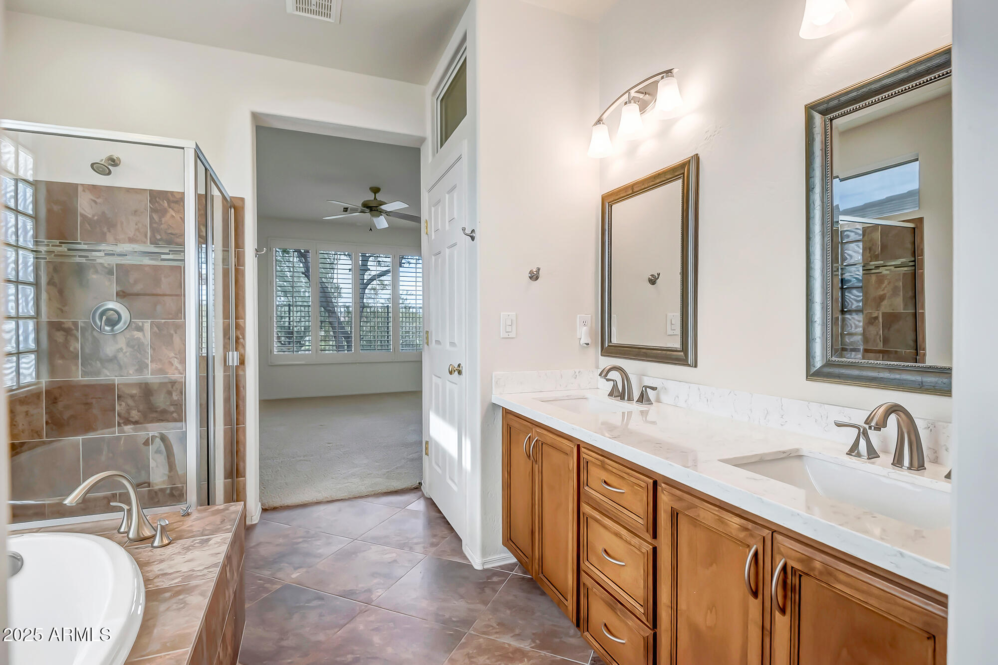 41628 North Cedar Chase Road Anthem, AZ 85086 - Photo 24 of 36 a bathroom with double sink and a mirror