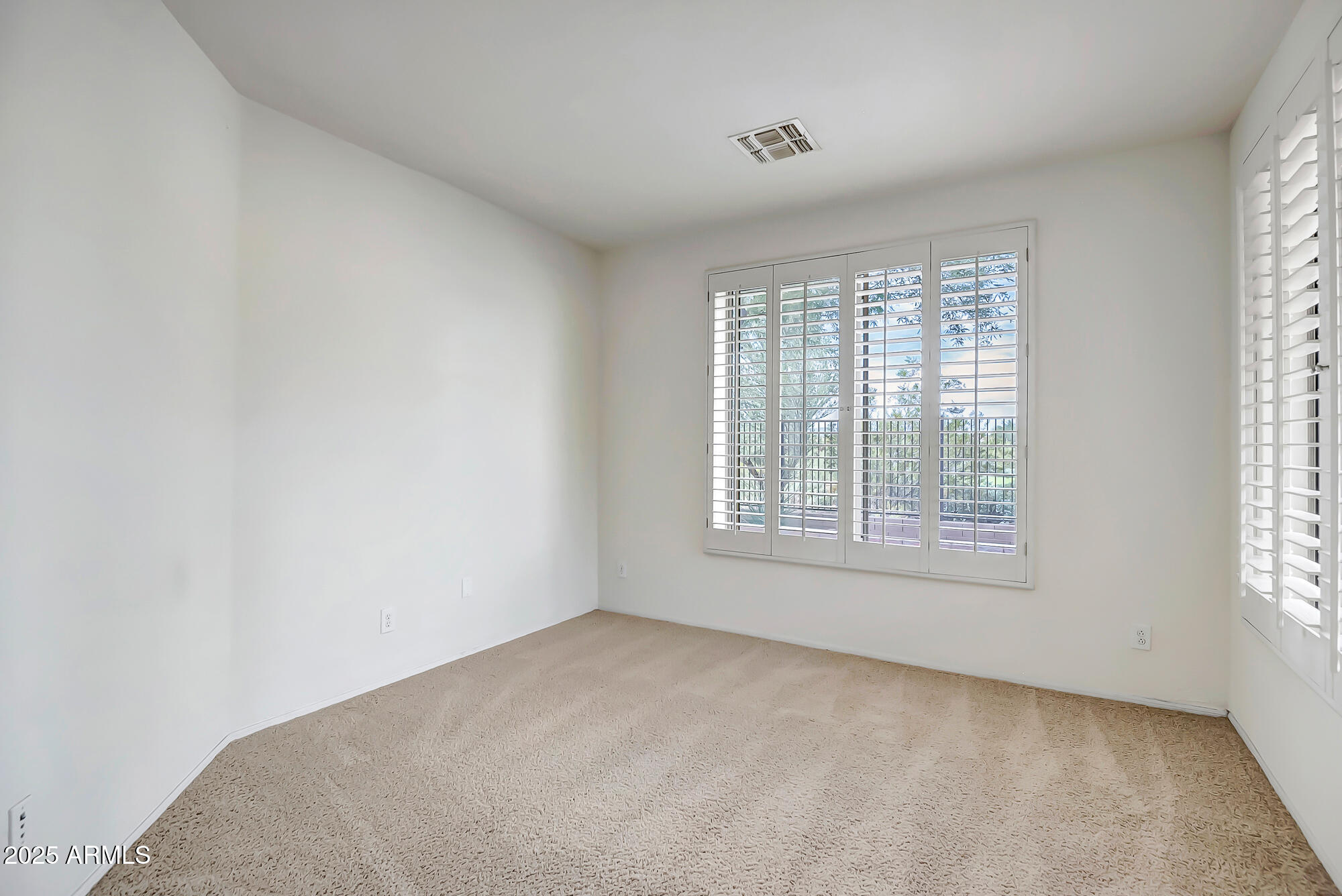 41628 North Cedar Chase Road Anthem, AZ 85086 - Photo 29 of 36 a view of an empty room with a window