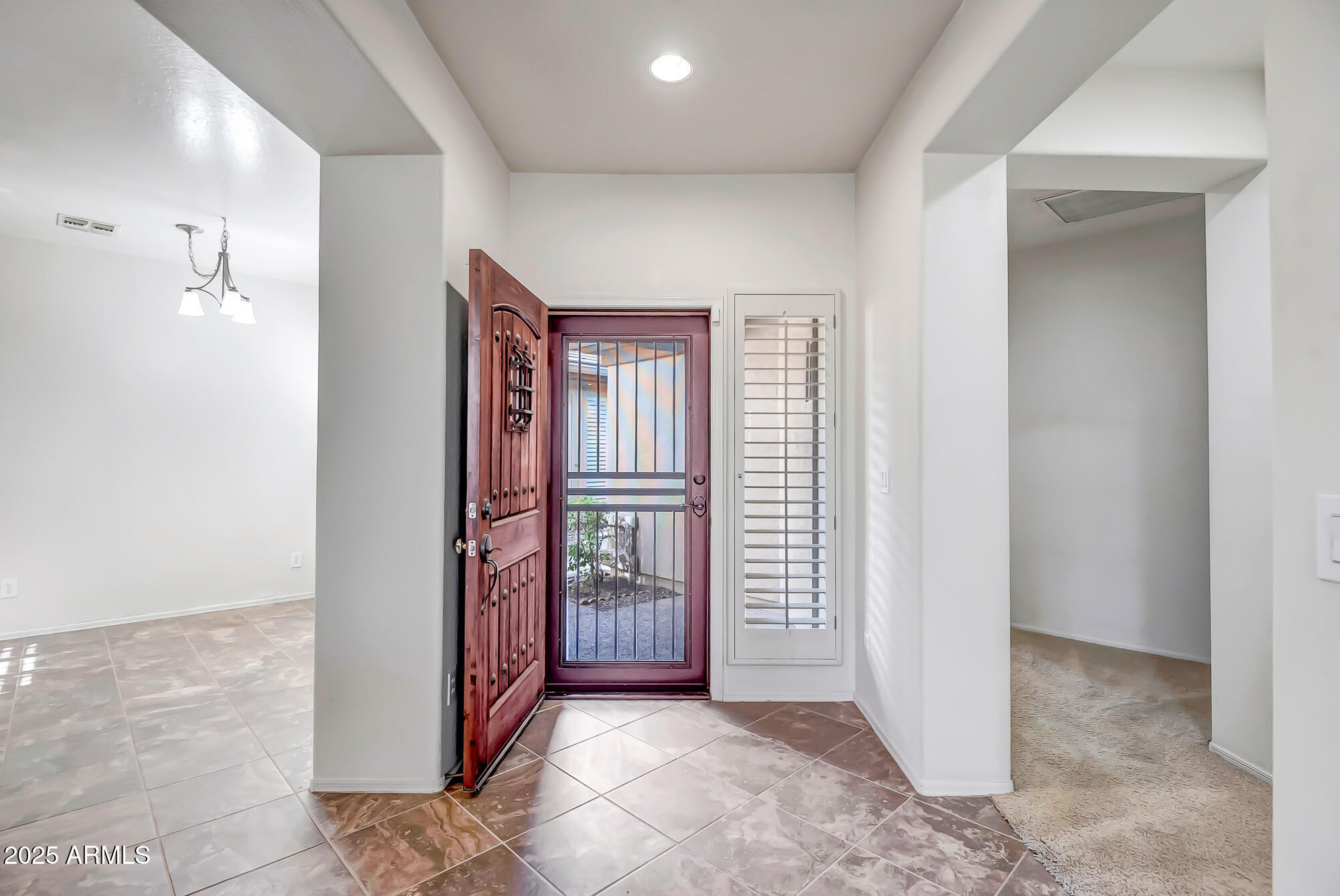 41628 North Cedar Chase Road Anthem, AZ 85086 - Photo 6 of 36 an entryway with a door