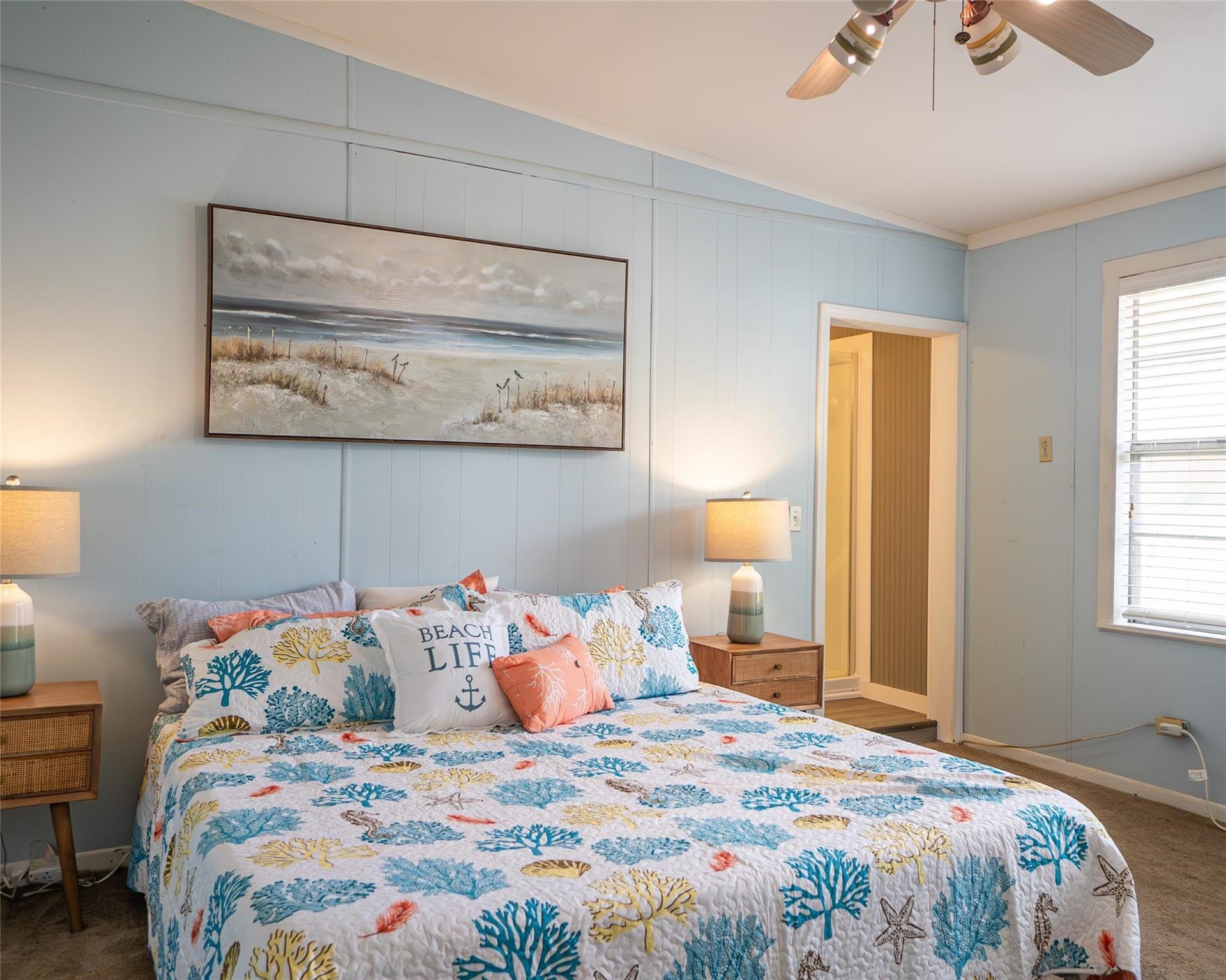 357 County Road 296 Sargent, TX 77414 - Photo 12 of 22 a bedroom with a bed and a window