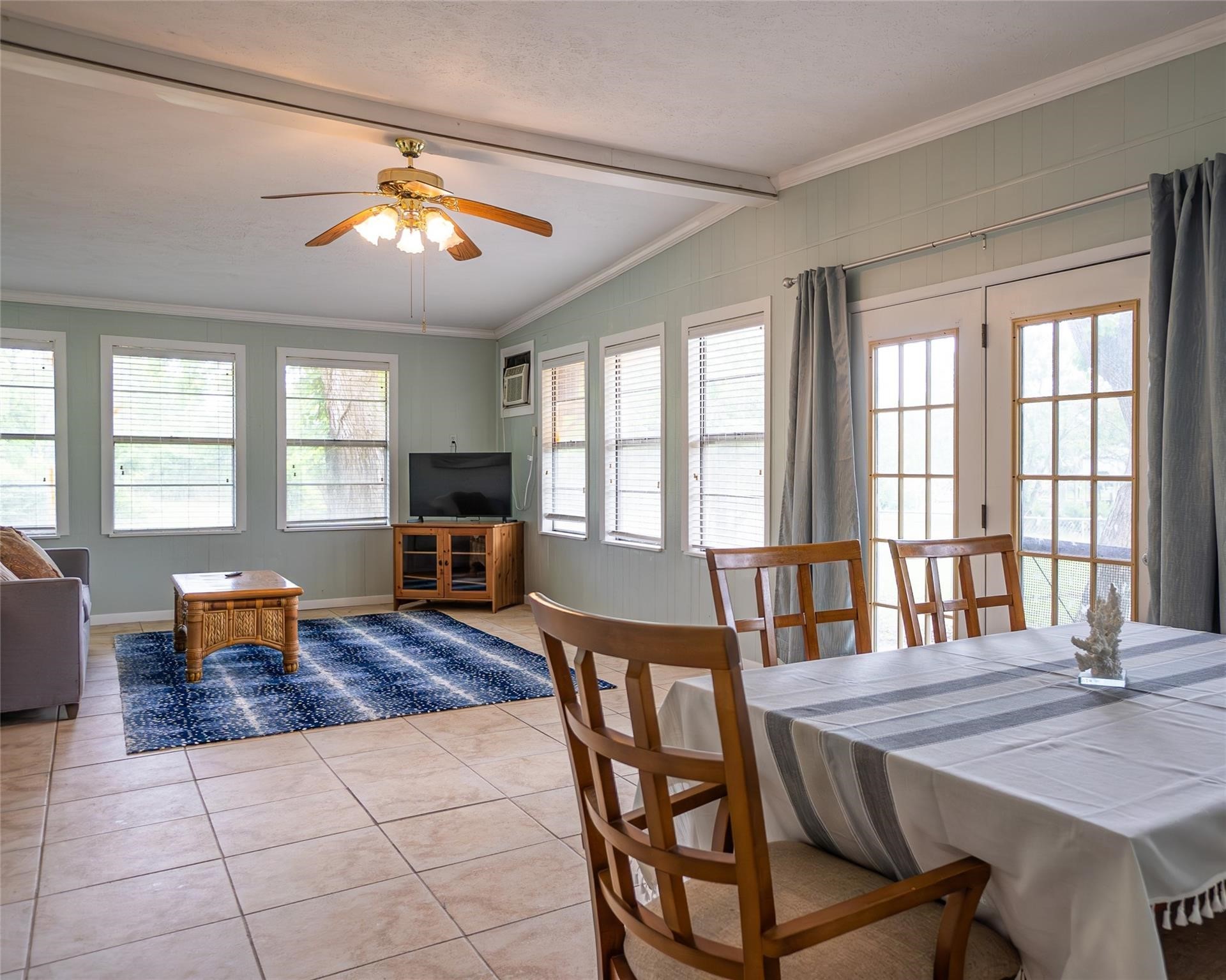 357 County Road 296 Sargent, TX 77414 - Photo 15 of 22 a view of a dining room with furniture a chandelier and wooden floor