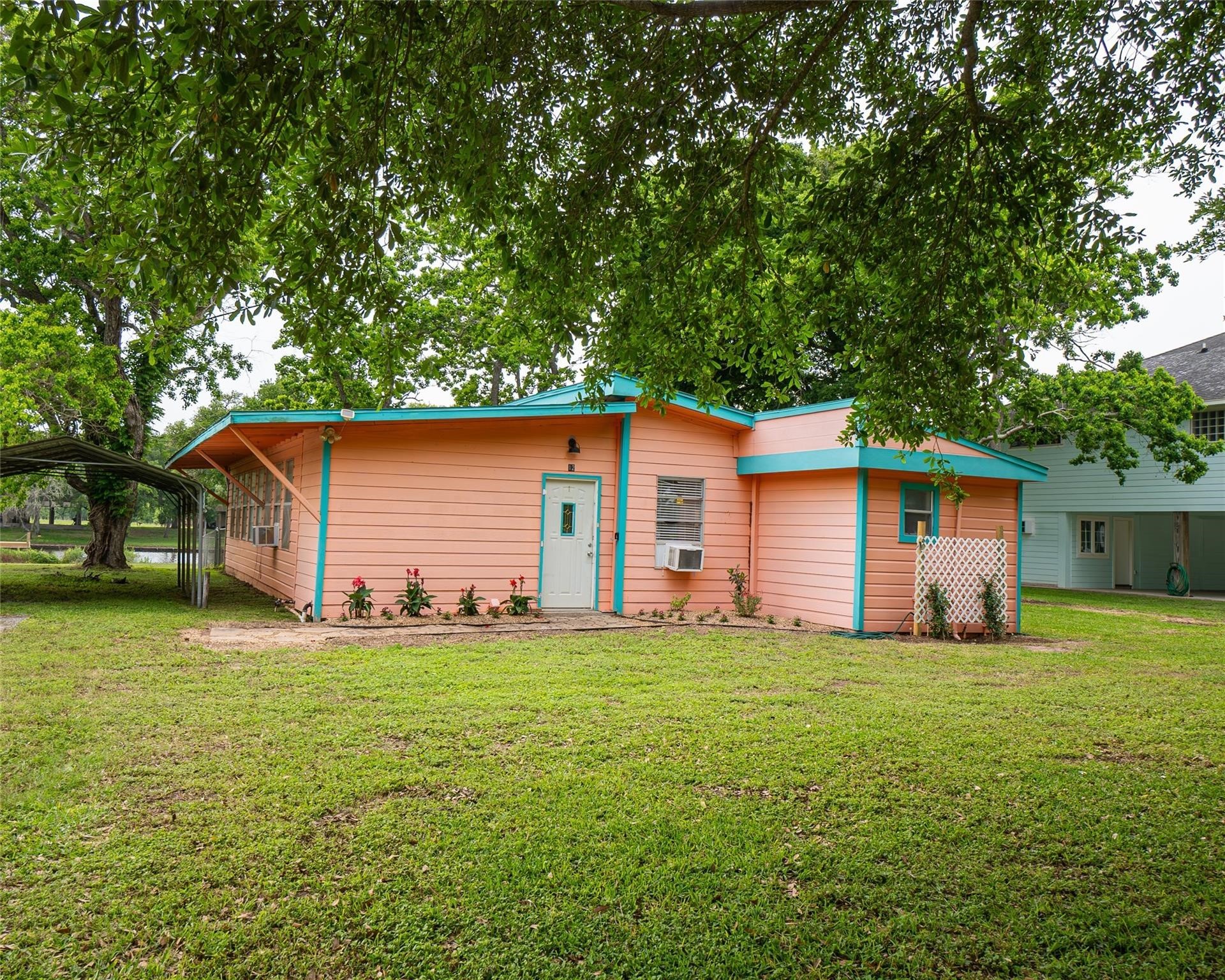 357 County Road 296 Sargent, TX 77414 - Photo 4 of 22 a view of a house with a yard