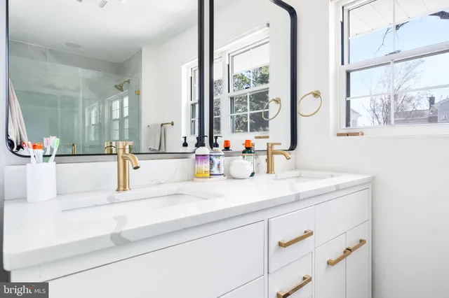 a kitchen with a sink and a window