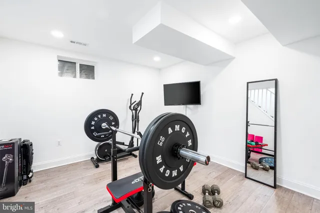 a view of play room and wooden floor