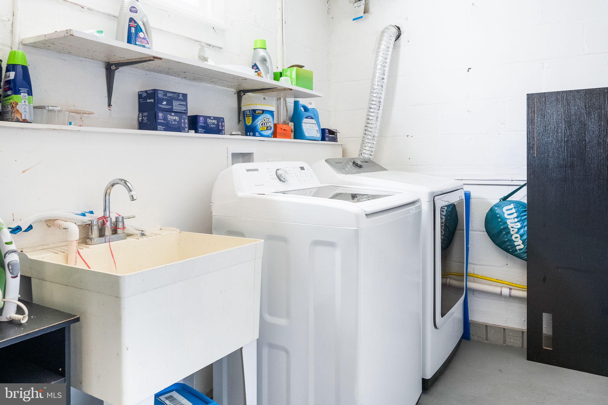 5020 River Road Bethesda, MD 20816 - Photo 22 of 35 a utility room with dryer and washer