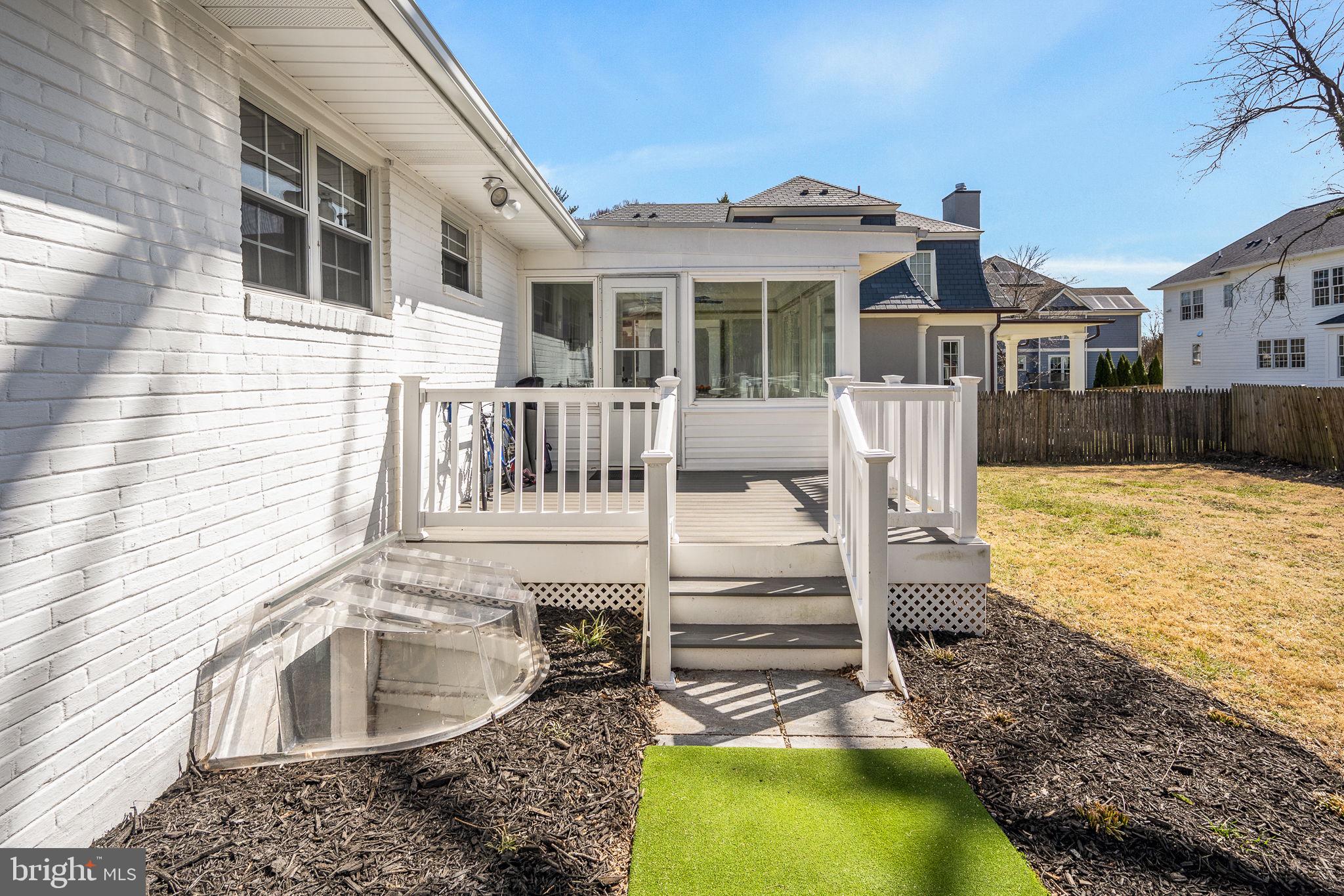 5020 River Road Bethesda, MD 20816 - Photo 31 of 35 a view of a house with backyard