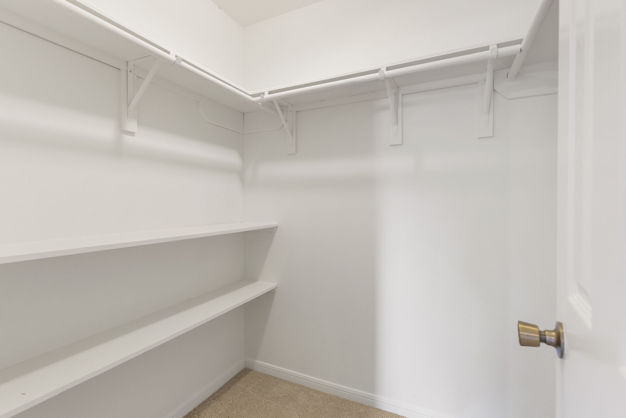 49 April Village Conroe, TX 77356 - Photo 25 of 46 a view of an empty walk in closet