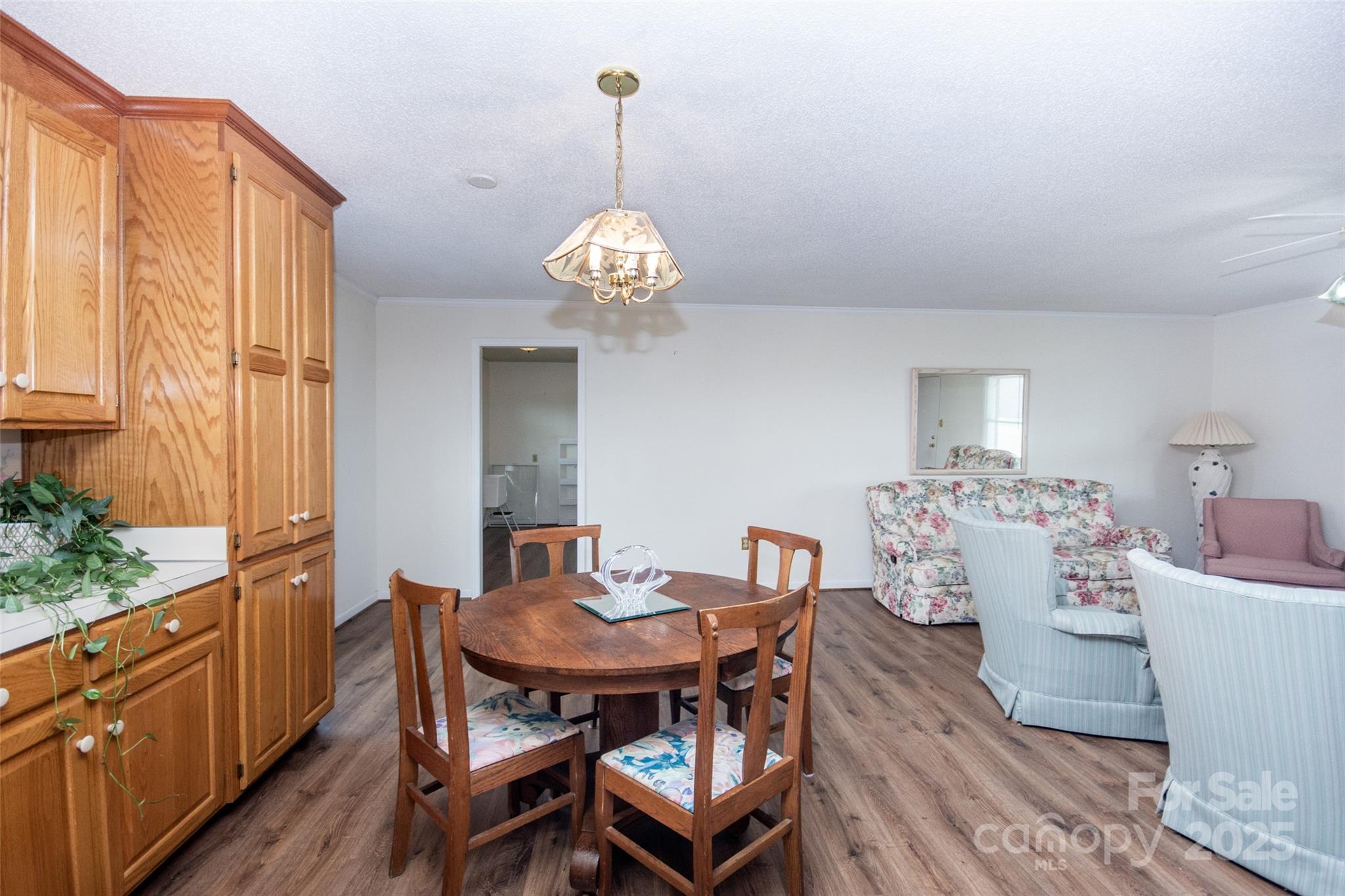 2890 Hobson Road Cleveland, NC 27013 - Photo 15 of 48 a view of a dining room with furniture window and wooden floor