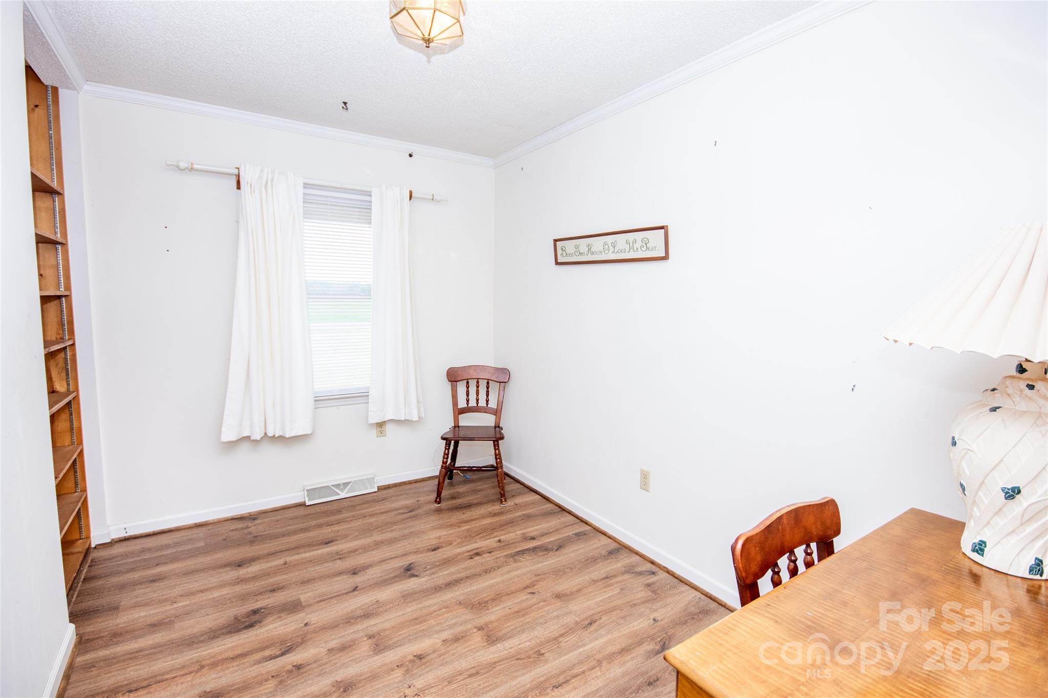 2890 Hobson Road Cleveland, NC 27013 - Photo 17 of 48 a bedroom with a bed and a window