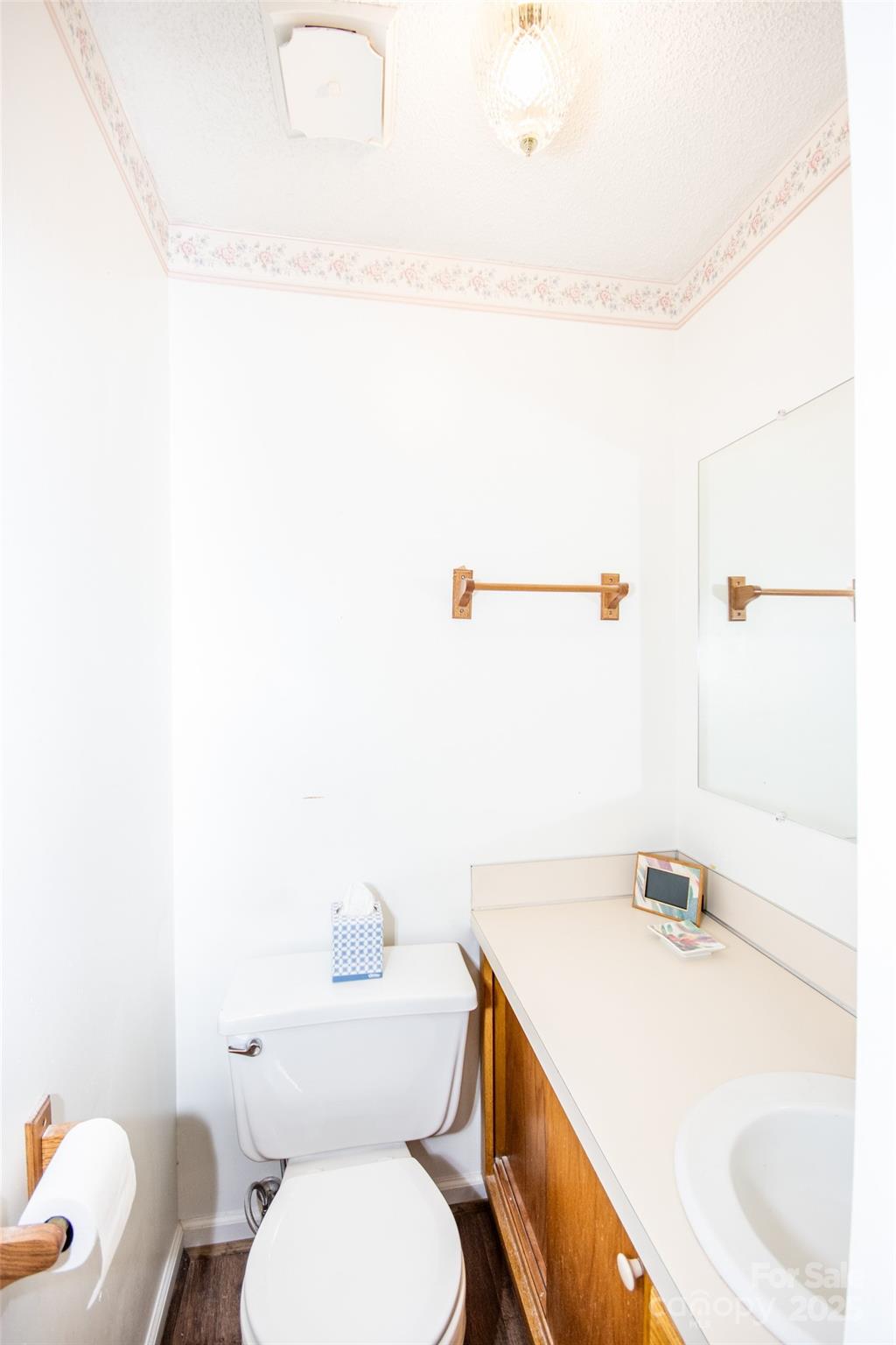 2890 Hobson Road Cleveland, NC 27013 - Photo 23 of 48 a bathroom with a sink a toilet and tub