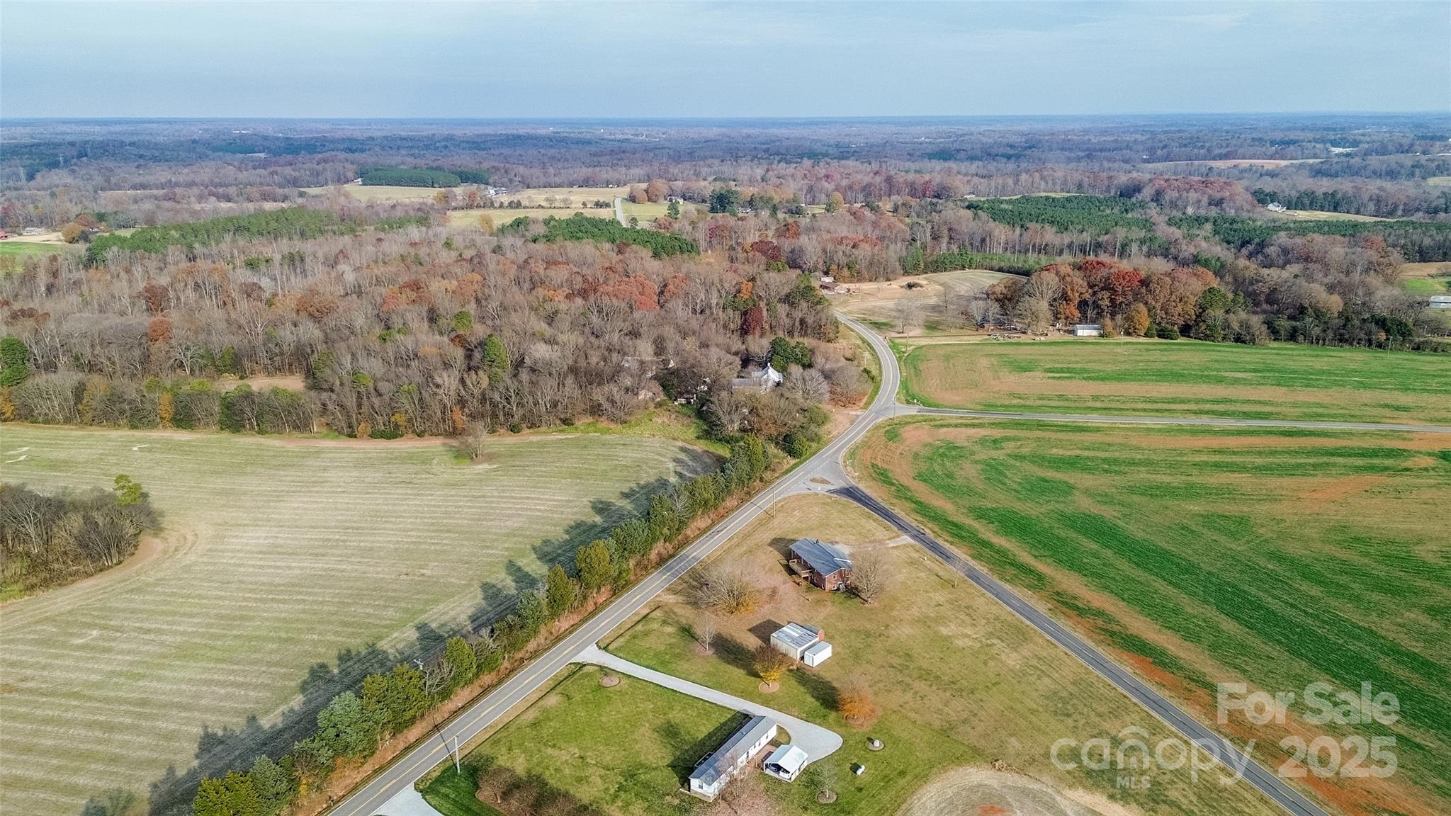 2890 Hobson Road Cleveland, NC 27013 - Photo 42 of 48 a view of a lake with a mountain