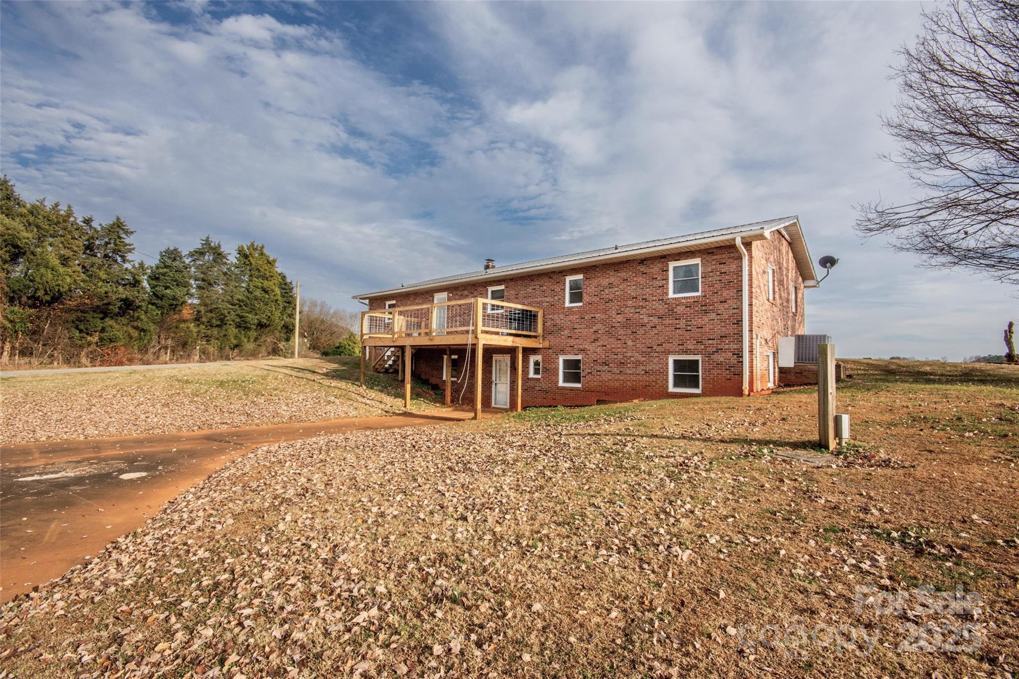 2890 Hobson Road Cleveland, NC 27013 - Photo 6 of 48 a front view of a house with a yard