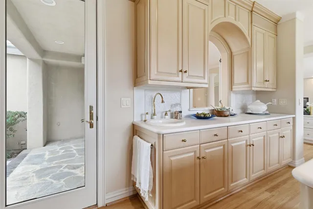 a view of a room with a large window and floor to ceiling window