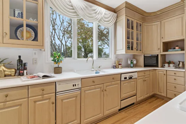 front view of a house with a small yard