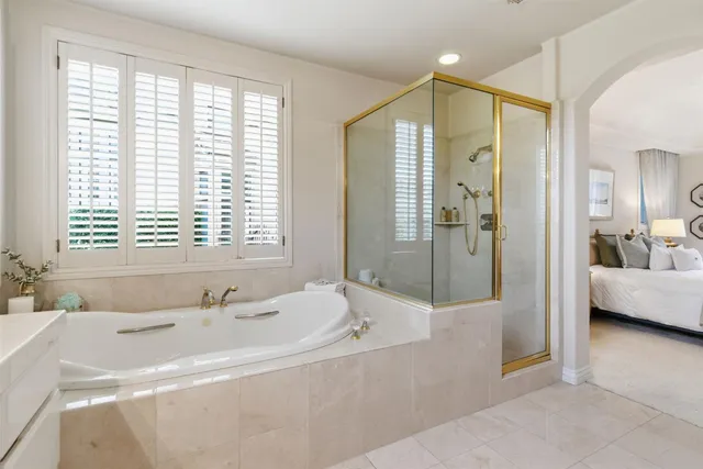 an aerial view of residential house with outdoor space and swimming pool