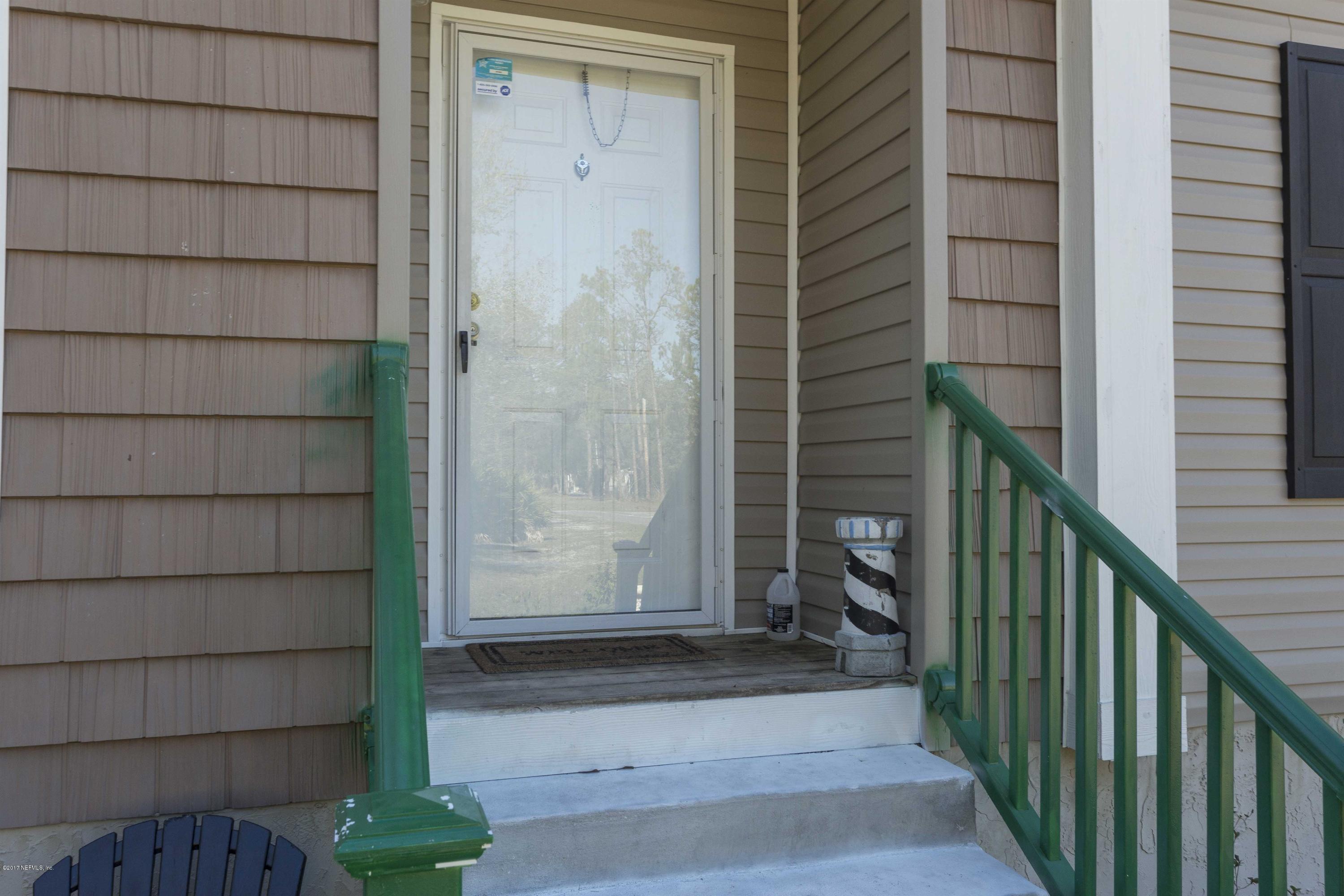 4049 Bronco Road Middleburg, FL 32068 - Photo 2 of 21 a view of wooden door