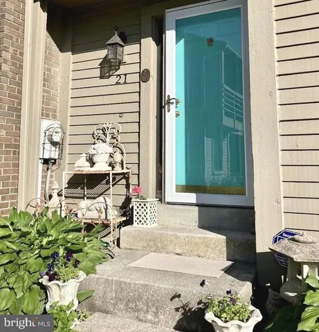 a front view of a house with yard