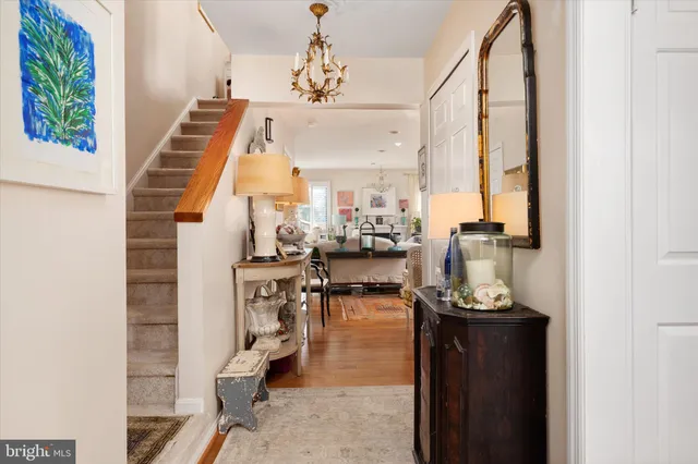 a view of living room with furniture and floor to ceiling window