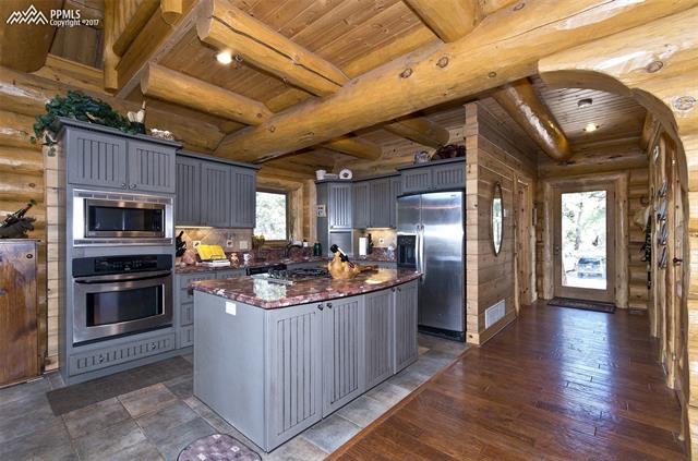 10615 Milam Road Colorado Springs, CO 80908 - Photo 20 of 25 Great room kitchen