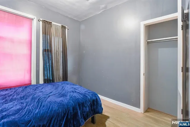 a view of a livingroom with wooden floor