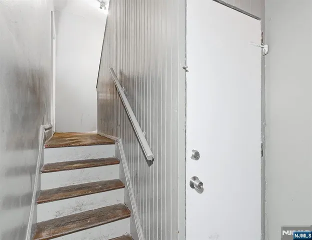 a view of a hallway with glass door