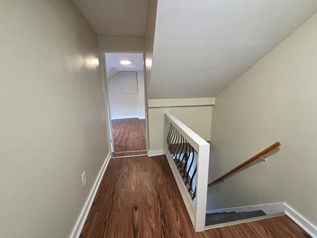 a view of hallway with stairs