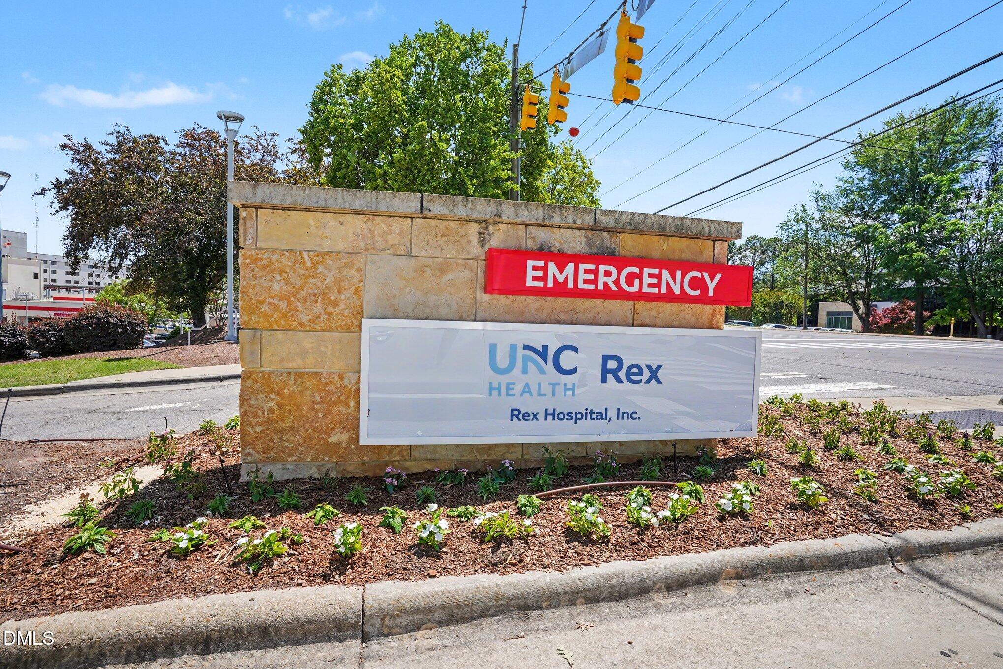 3555 Mill Run Raleigh, NC 27612 - Photo 21 of 25 a sign that is on the side of a street