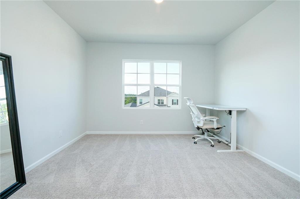 4774 Mock Orange Street Atlanta, GA 30331 - Photo 15 of 29 an empty room with a window