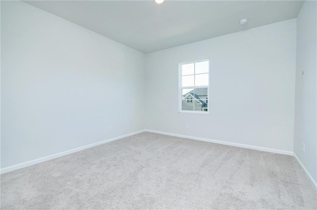 4774 Mock Orange Street Atlanta, GA 30331 - Photo 18 of 29 an empty room with a window