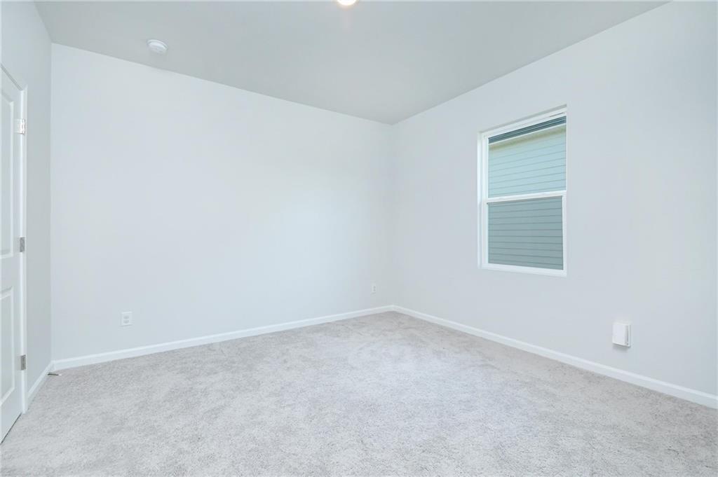 4774 Mock Orange Street Atlanta, GA 30331 - Photo 19 of 29 an empty room with a window