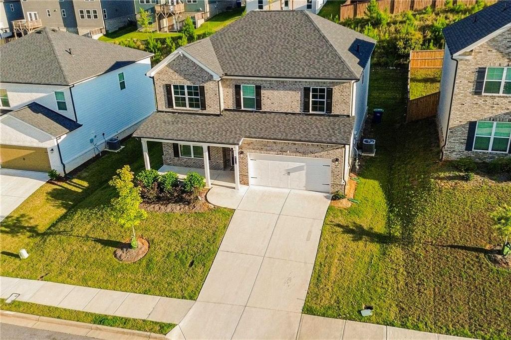 4774 Mock Orange Street Atlanta, GA 30331 - Photo 2 of 29 a aerial view of a house with a swimming pool
