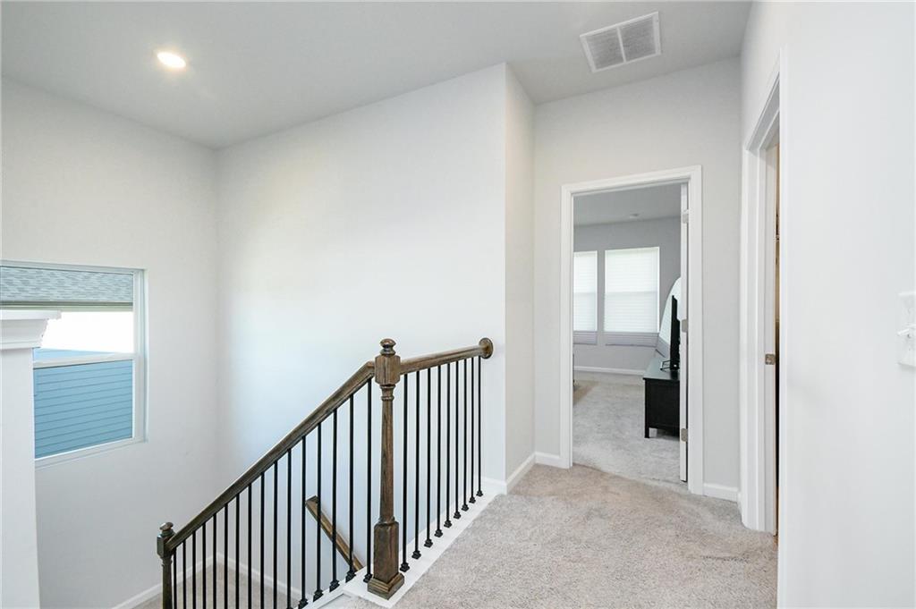 4774 Mock Orange Street Atlanta, GA 30331 - Photo 21 of 29 a view of a hallway with a hallway
