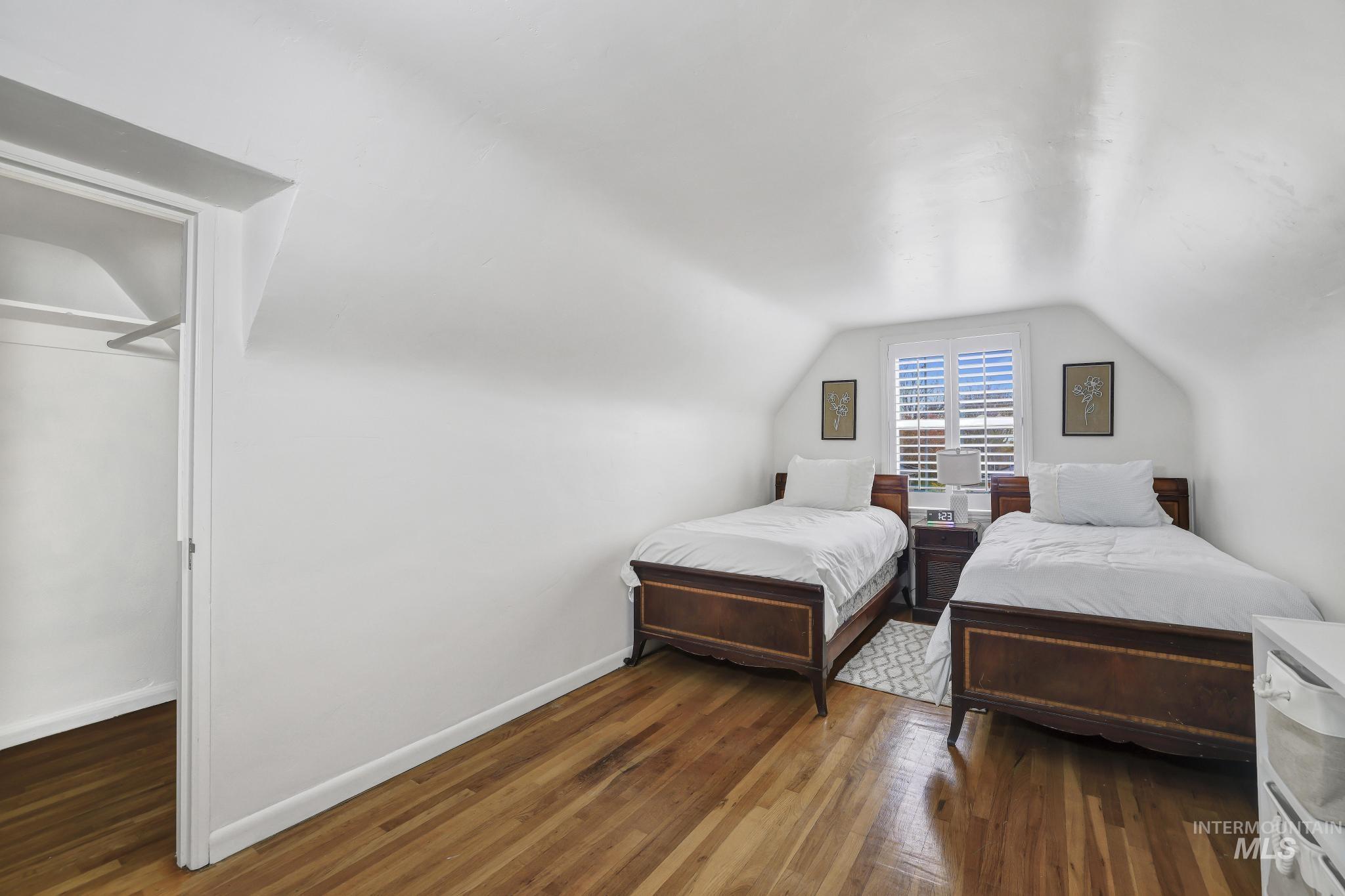 102 Fillmore Street Twin Falls, ID 83301 - Photo 28 of 48 Bedroom with baseboards and dark wood-style flooring