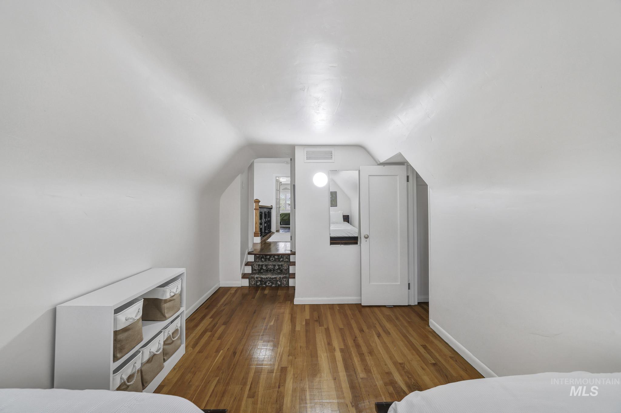 102 Fillmore Street Twin Falls, ID 83301 - Photo 29 of 48 Bedroom with dark wood finished floors and baseboards