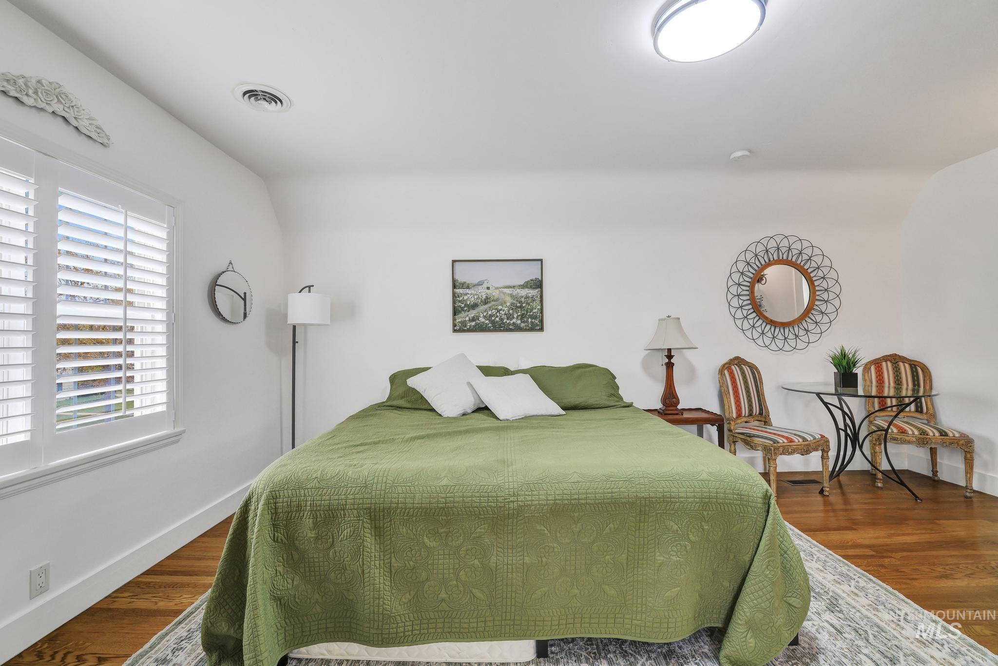 102 Fillmore Street Twin Falls, ID 83301 - Photo 33 of 48 Bedroom featuring baseboards and dark wood finished floors