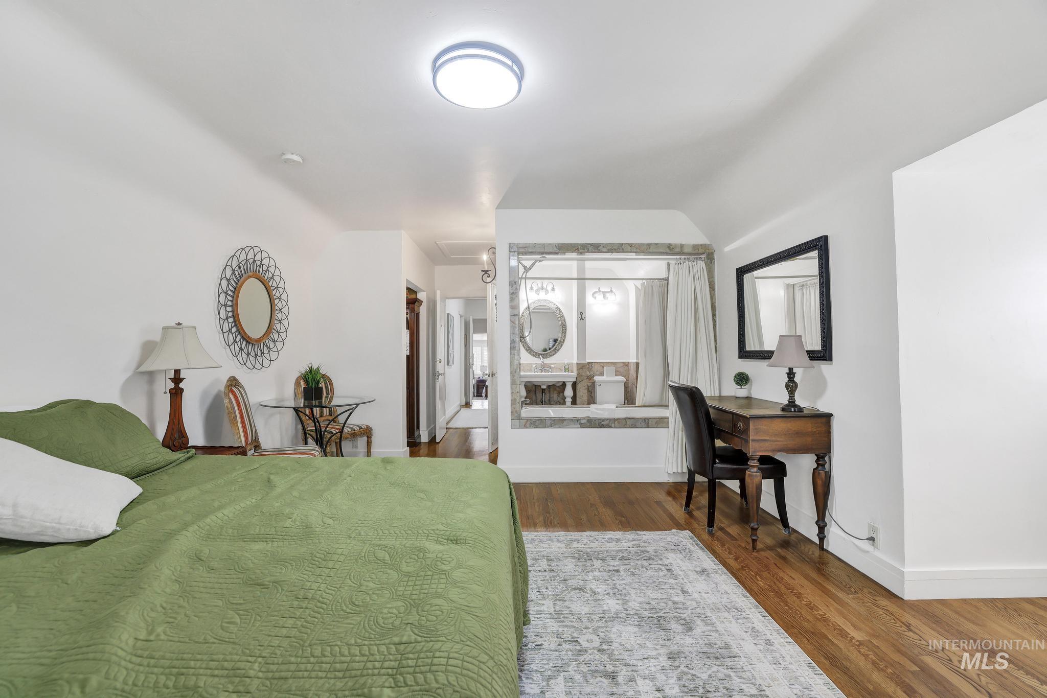 102 Fillmore Street Twin Falls, ID 83301 - Photo 34 of 48 Bedroom featuring dark wood-style floors