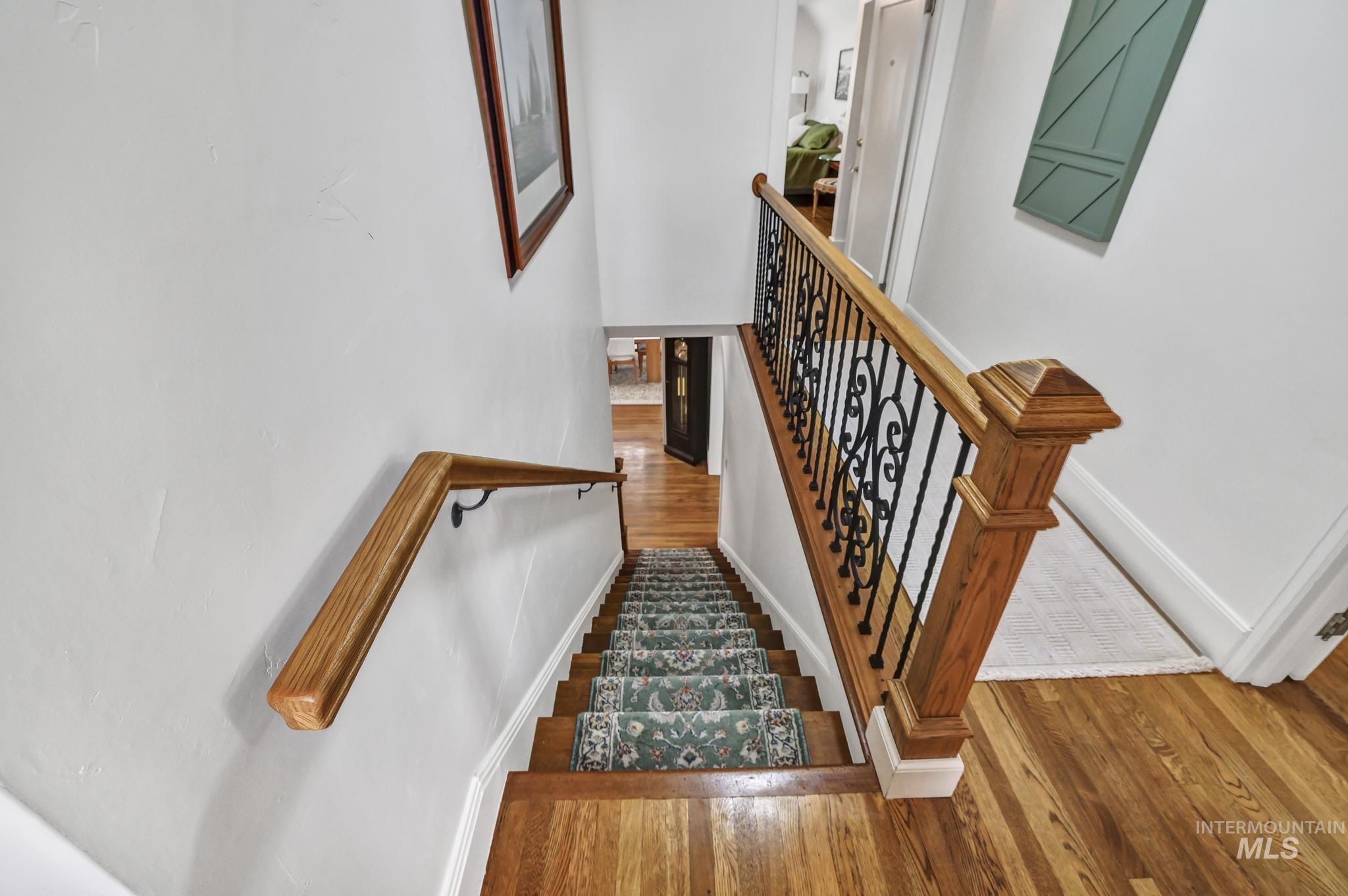 102 Fillmore Street Twin Falls, ID 83301 - Photo 38 of 48 Stairway with wood-type flooring