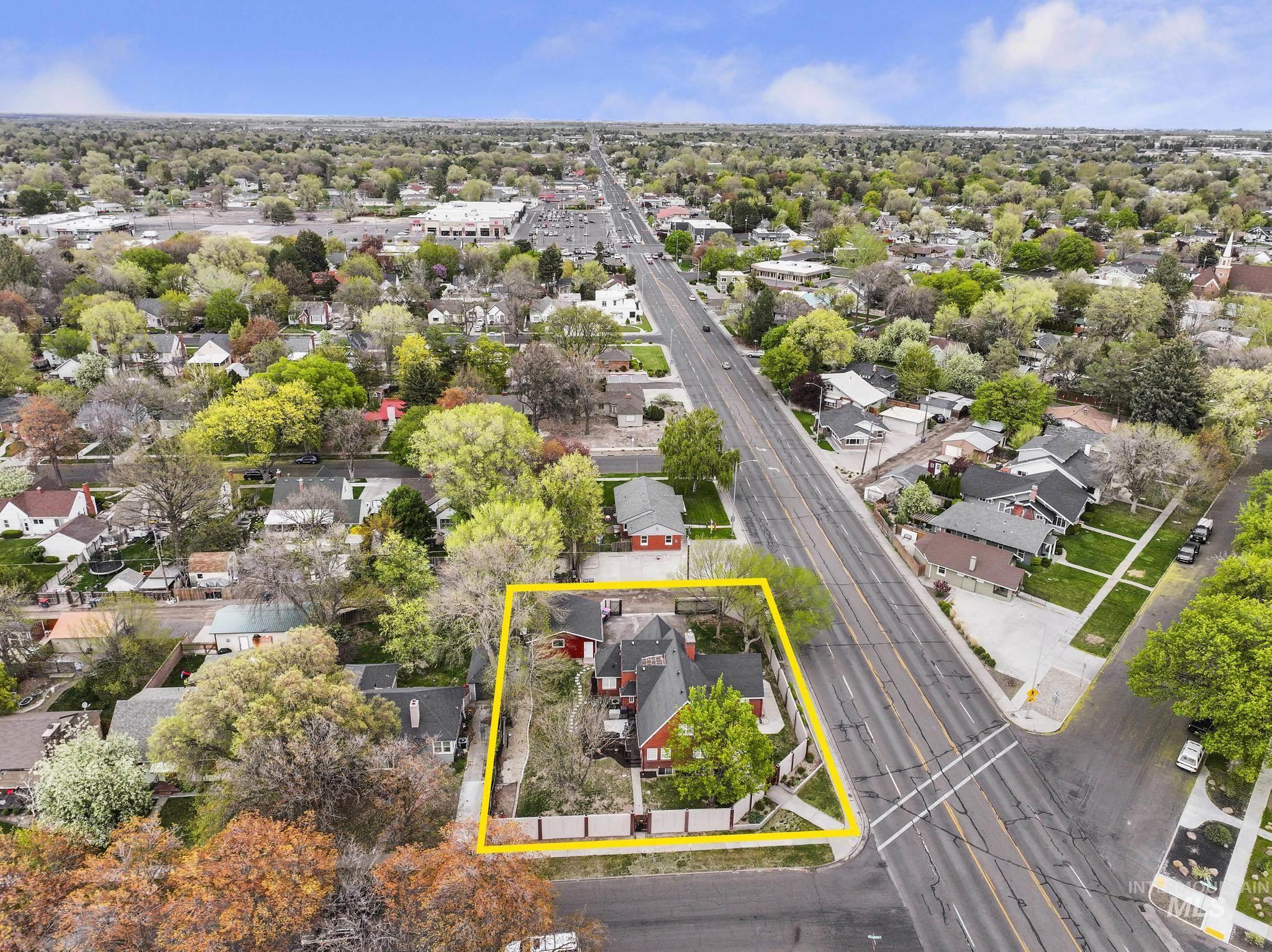 102 Fillmore Street Twin Falls, ID 83301 - Photo 6 of 48 Aerial perspective of suburban area featuring property parcel outlined