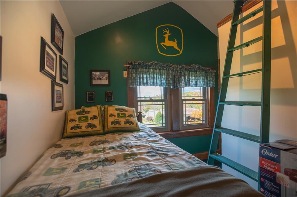 702 Keister Road Venus, PA 16364 - Photo 23 of 39 a bedroom with a bed and a large window