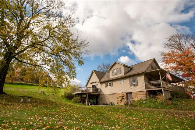 a view of house with outdoor space