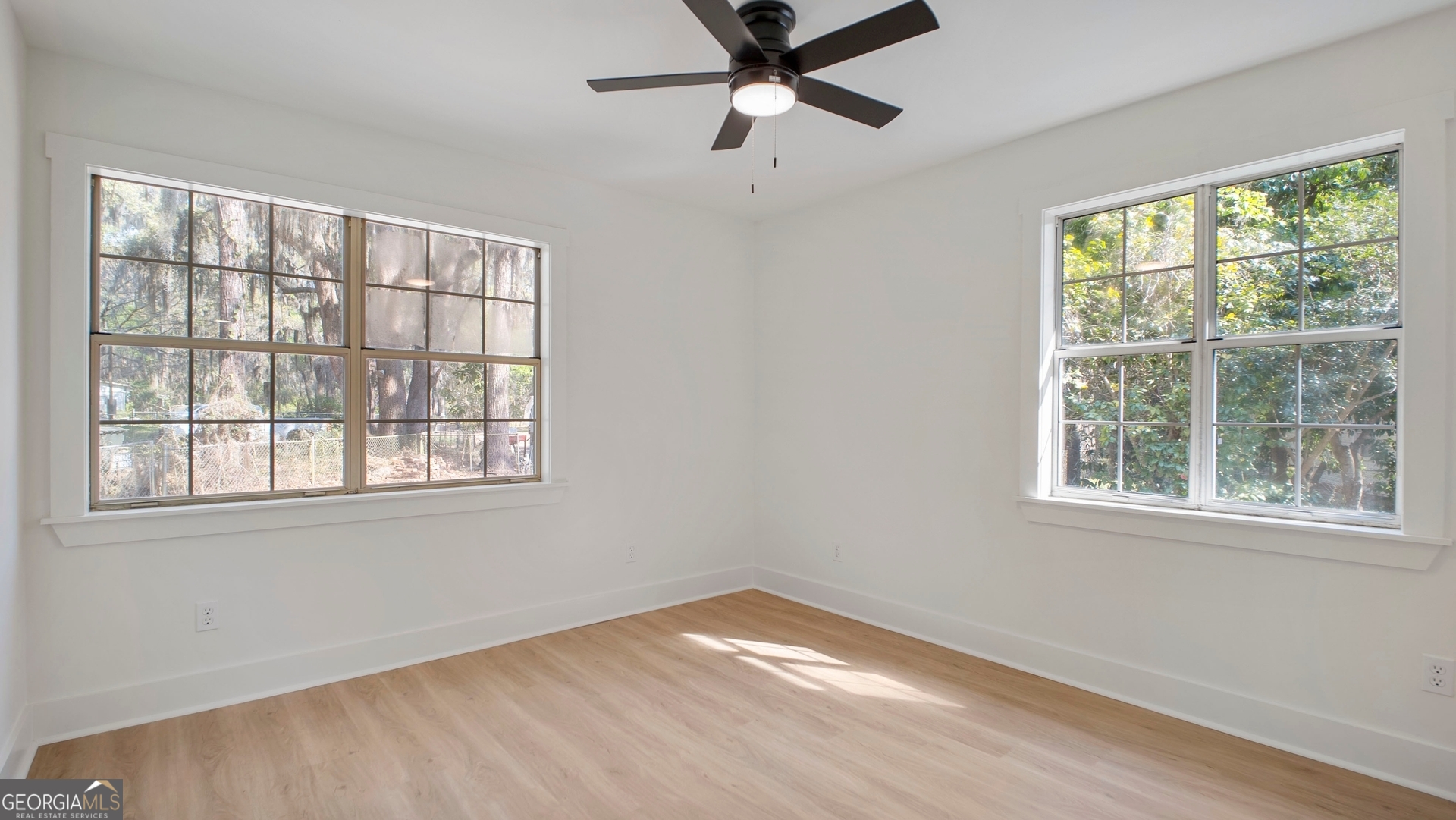 79 Terry Drive Midway, GA 31320 - Photo 13 of 27 a view of an empty room with a window