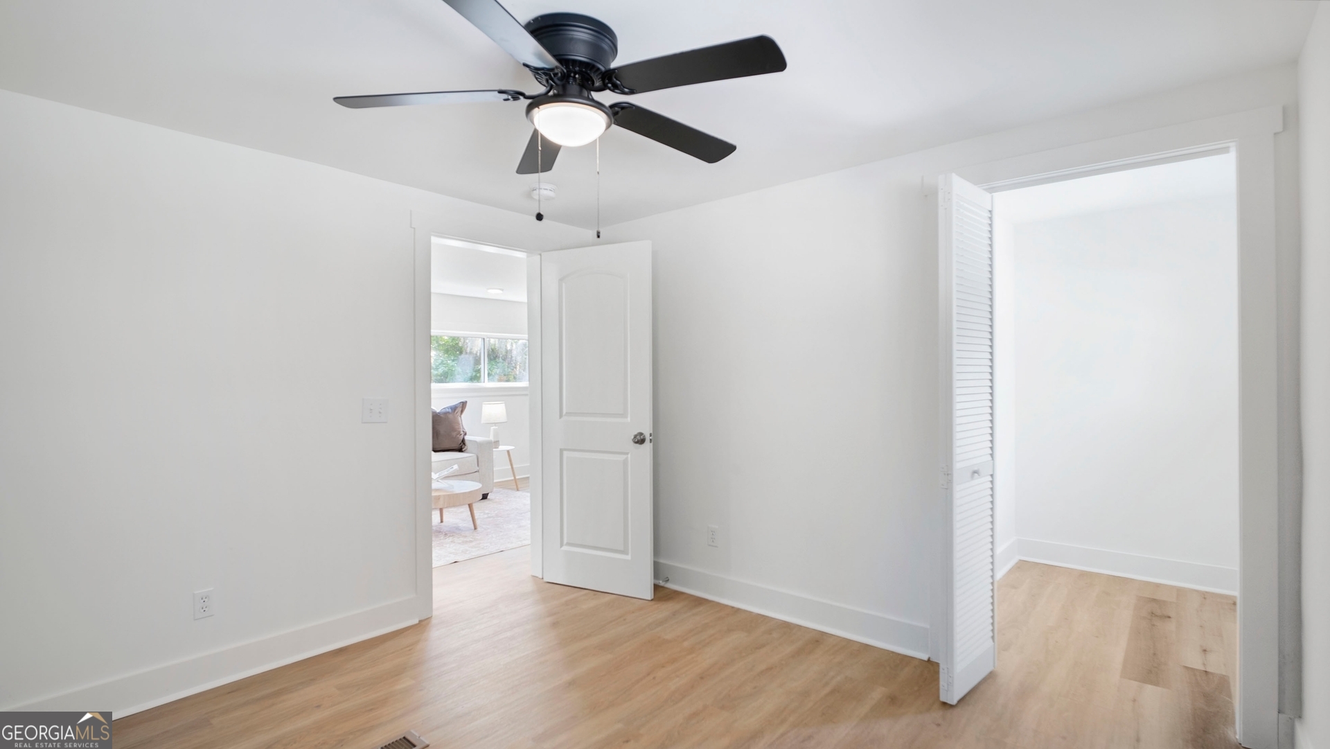 79 Terry Drive Midway, GA 31320 - Photo 14 of 27 wooden floor in an empty room