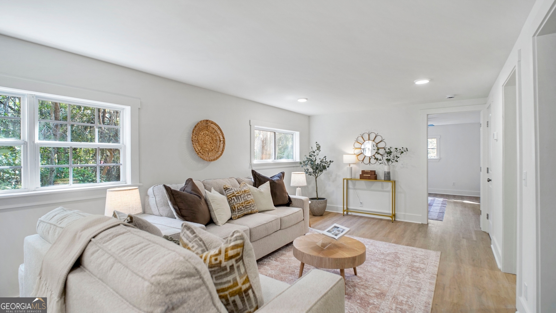 79 Terry Drive Midway, GA 31320 - Photo 3 of 27 a bed room with a bed and a large window